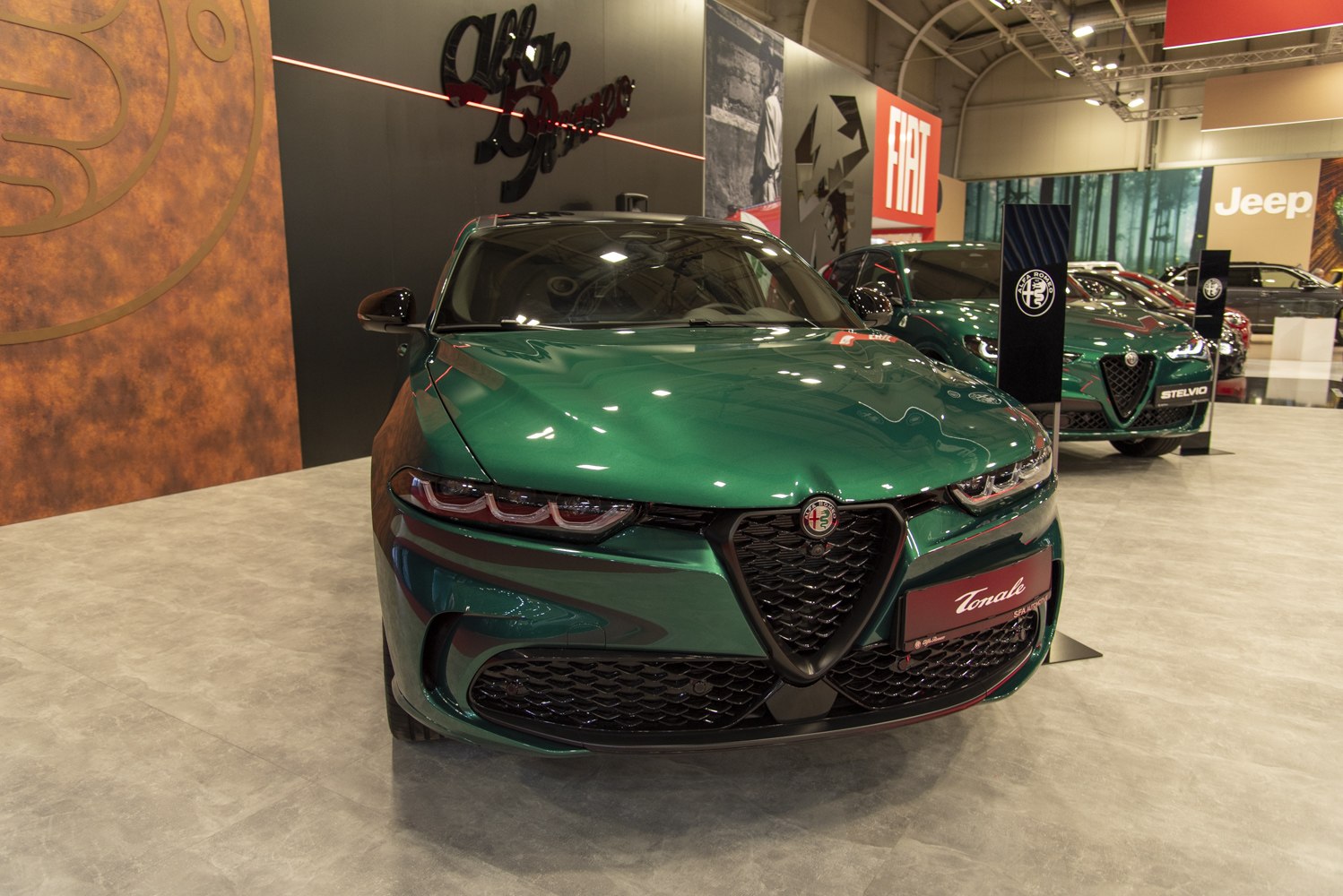 Front view with distinctive triangular grille and triple LED headlights