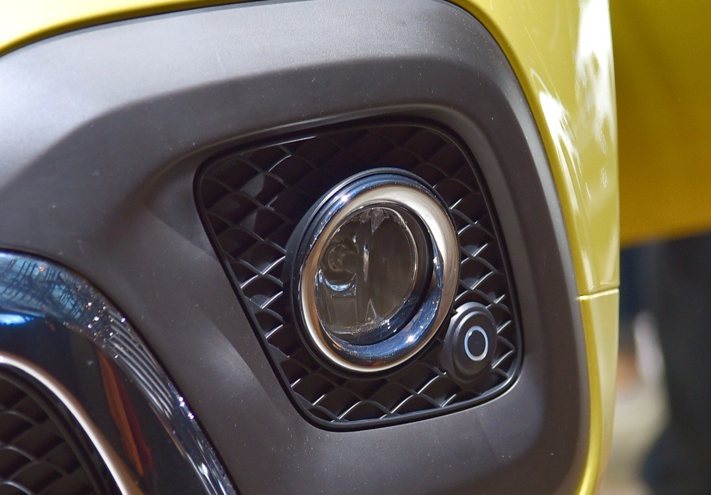 Front fog light and grille detail close-up