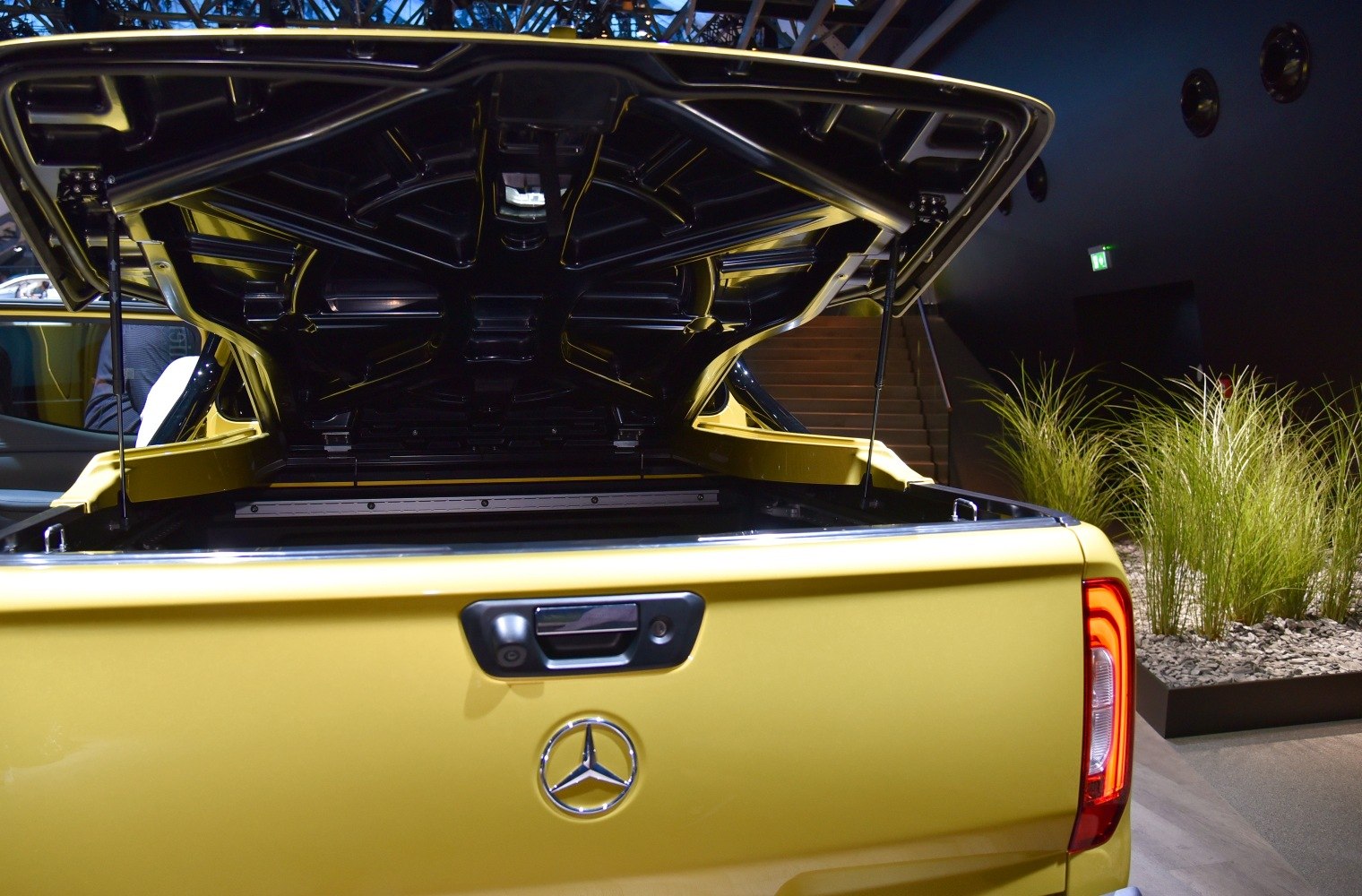 Open tailgate and cargo bed with truck bed cover