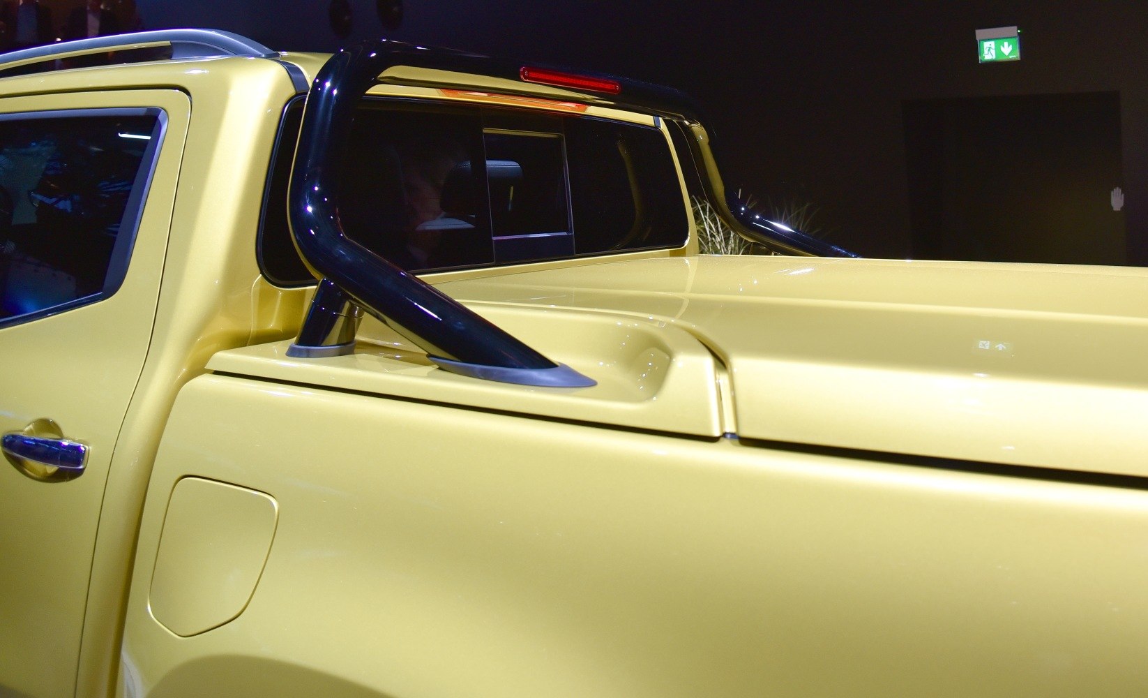 Close-up of pickup truck bed and black roll bar