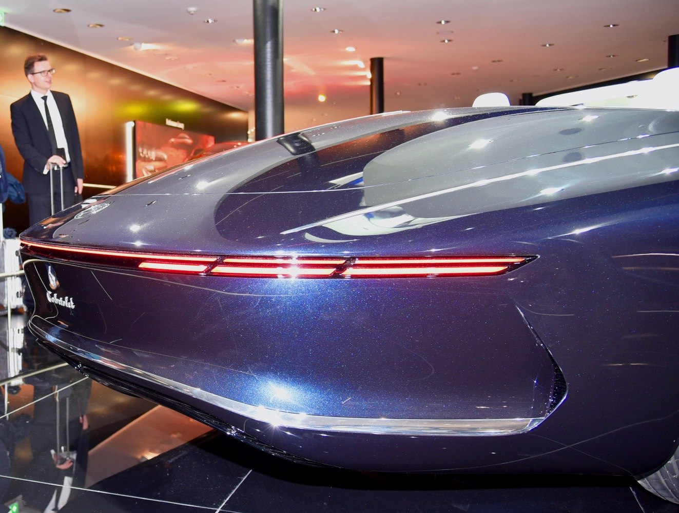 Sleek rear end with slim, horizontal LED taillights in a futuristic design