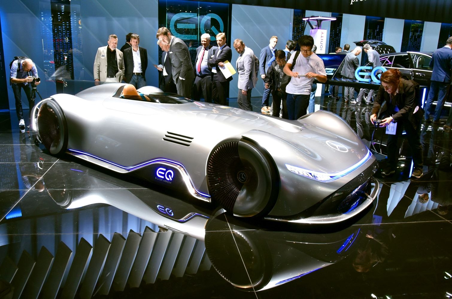 Sleek single-seater electric concept with futuristic LED lights and covered wheels