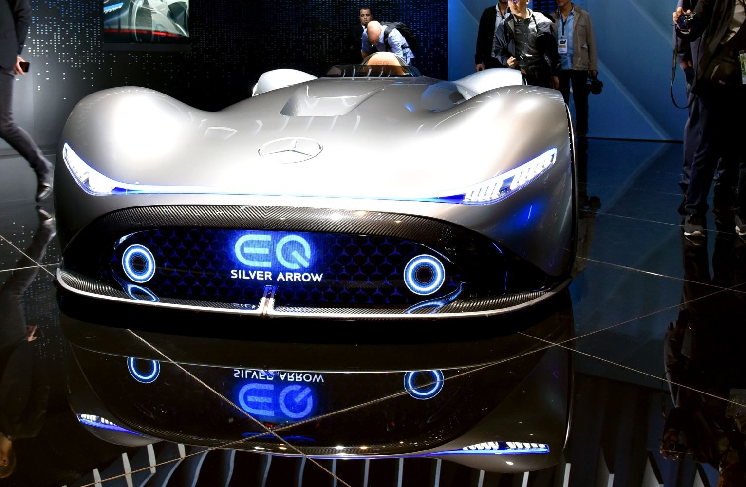 Futuristic front design with sleek curves and advanced LED headlights