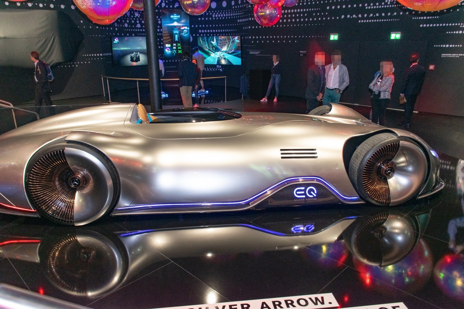Futuristic streamlined electric concept car with aerodynamic large disc wheels