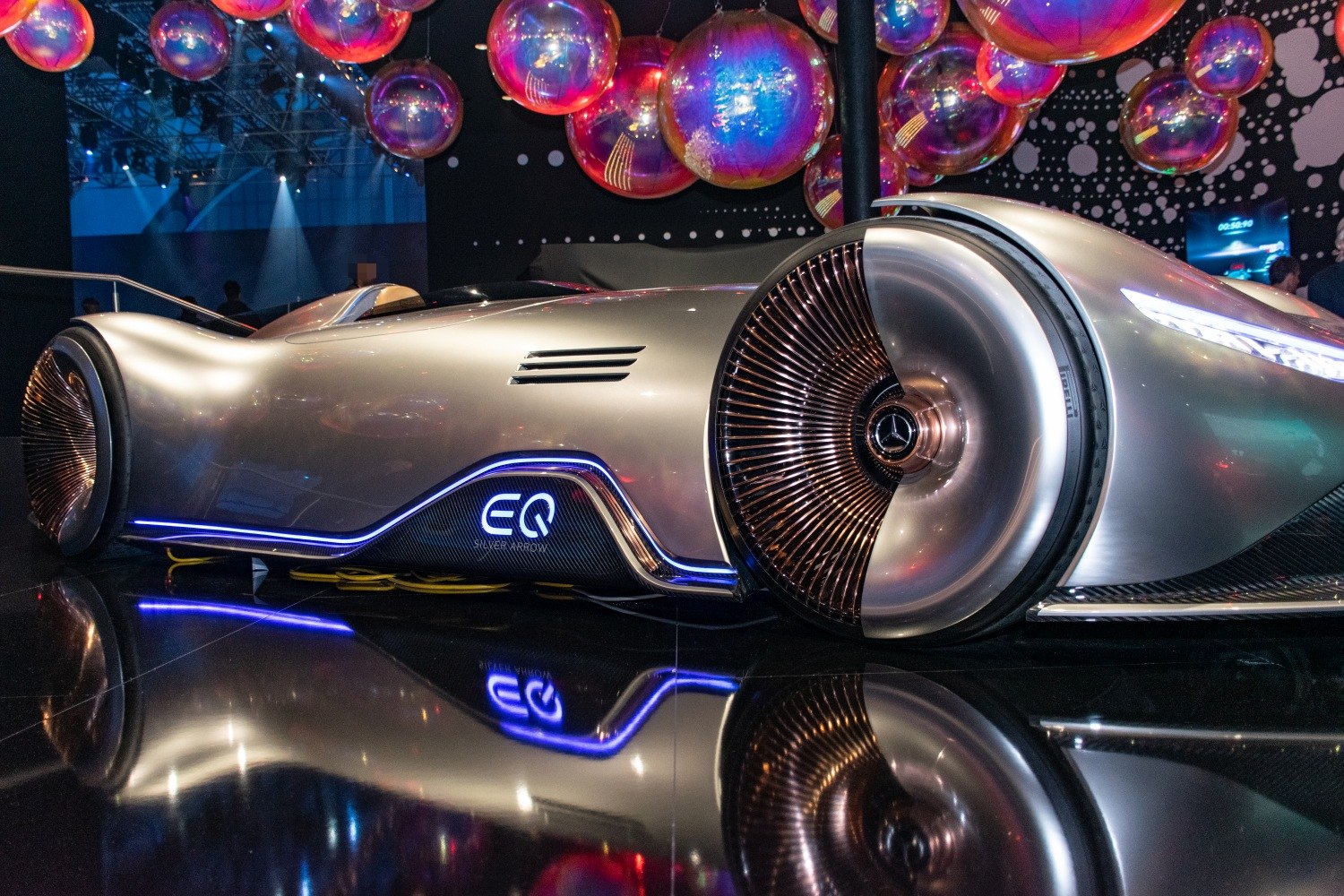 Sleek aerodynamic body with turbine-style illuminated wheels.