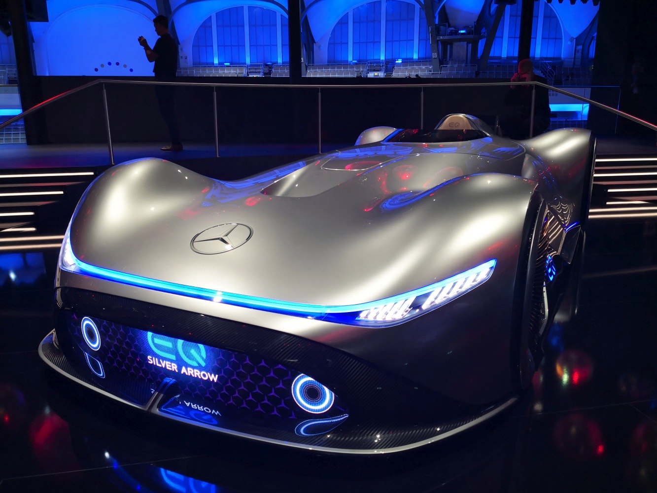 Streamlined silver electric concept with LED headlights and aerodynamic design