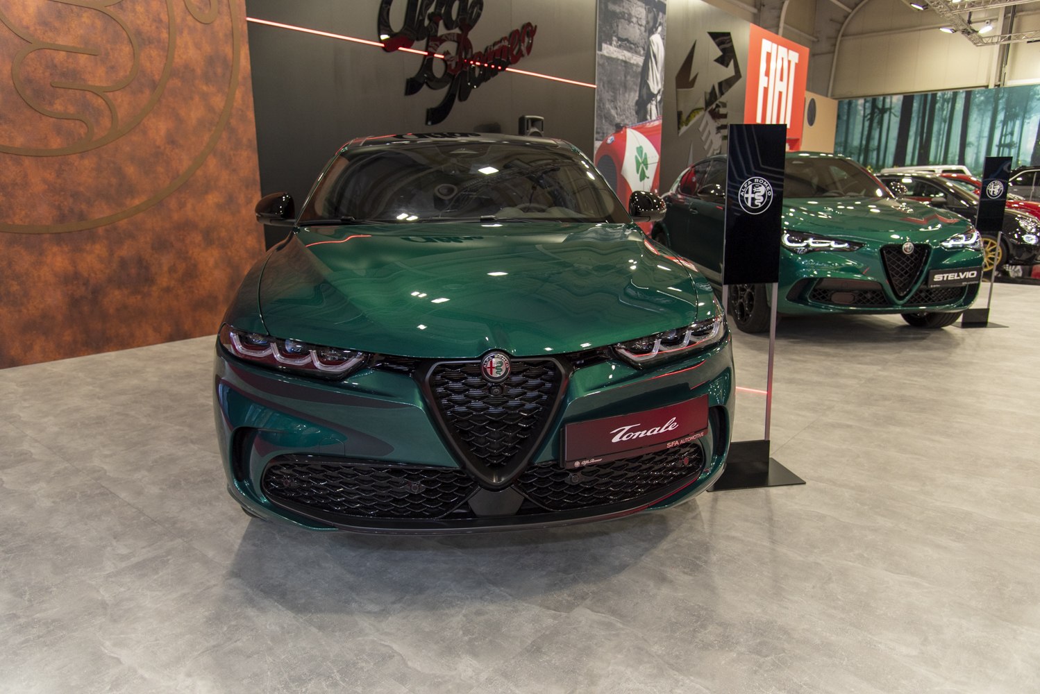 Front view with triangular grille and triple headlights