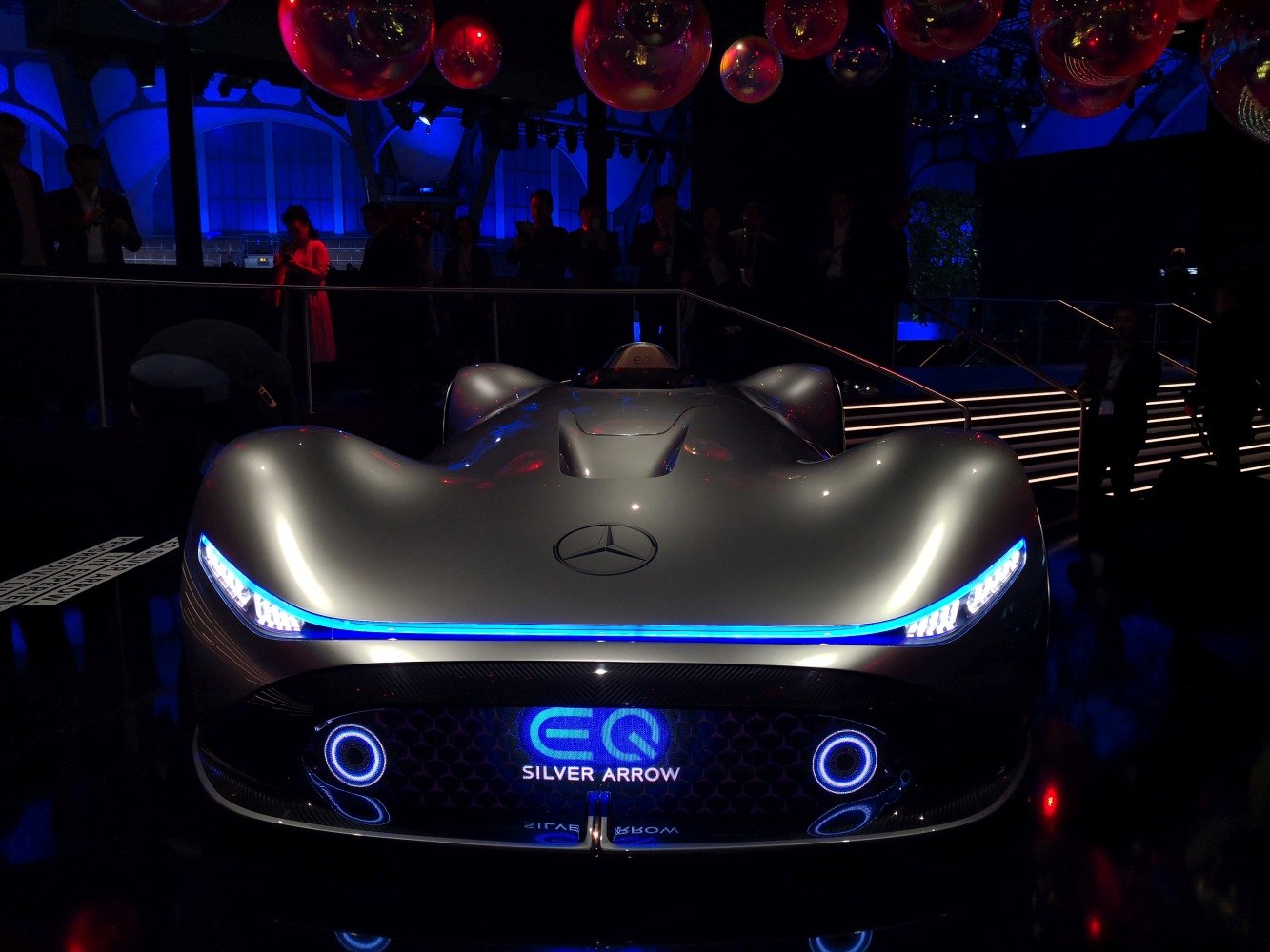 Futuristic sleek front with blue LED lights and aerodynamic design