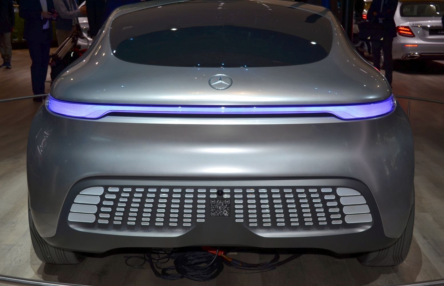 Rear view with illuminated light bar and perforated grill