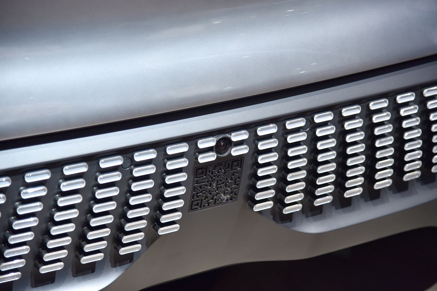 Futuristic front grille with integrated camera and QR code