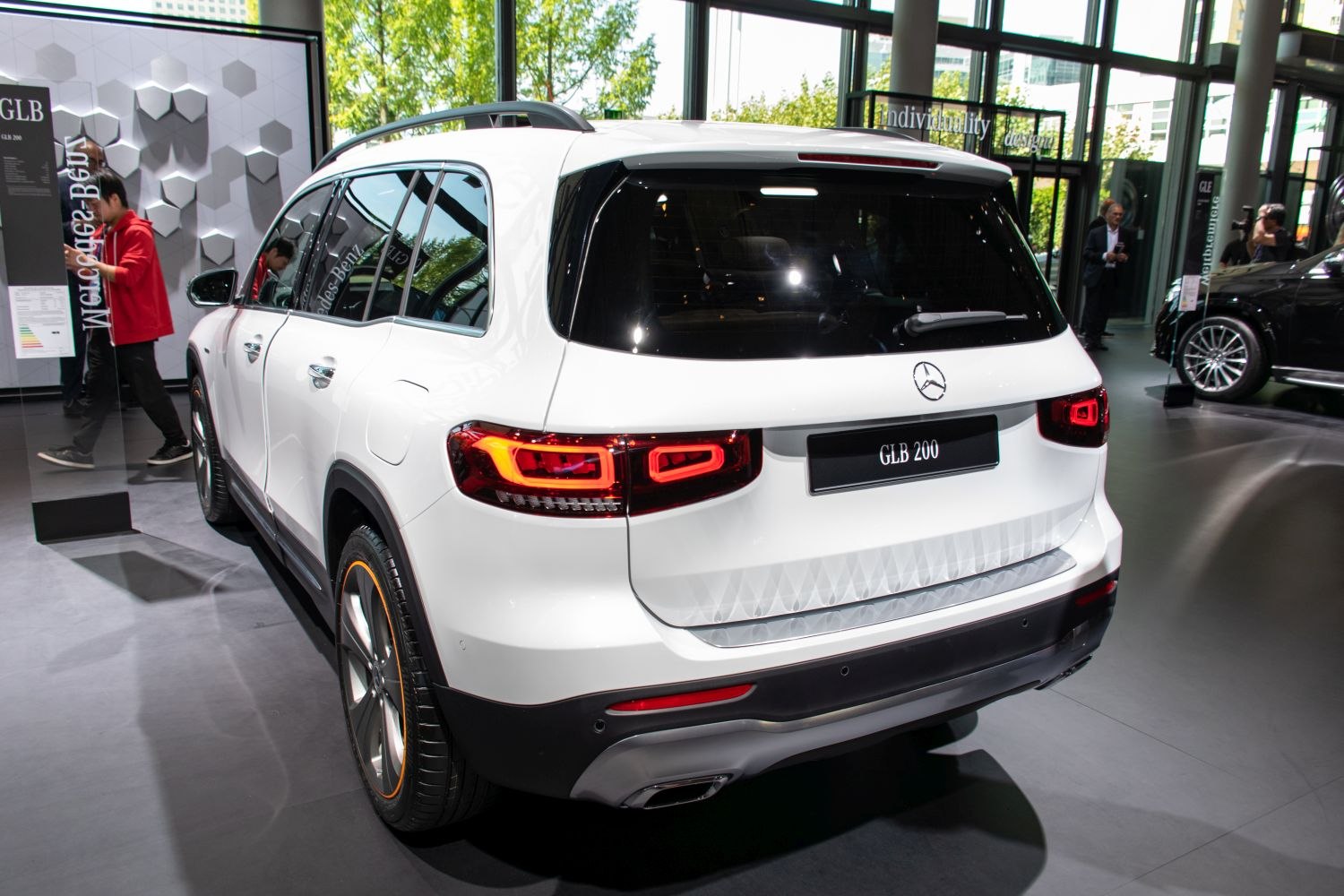 White SUV rear with LED tail lights and tinted windows