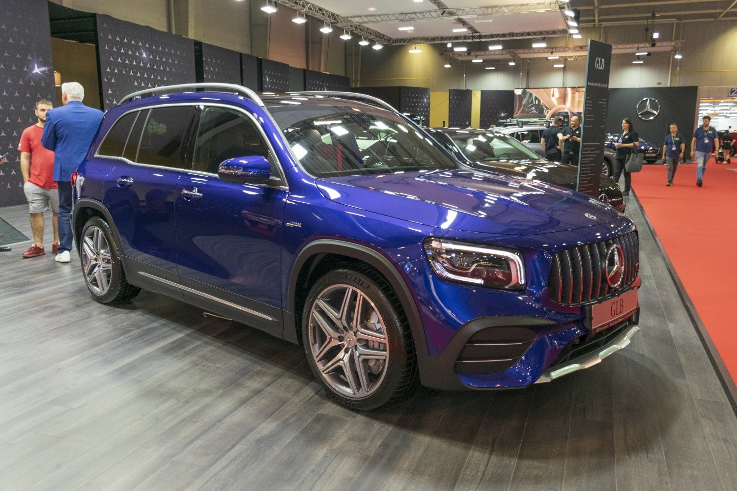 Front and side view of modern SUV with distinctive grille and sleek lines