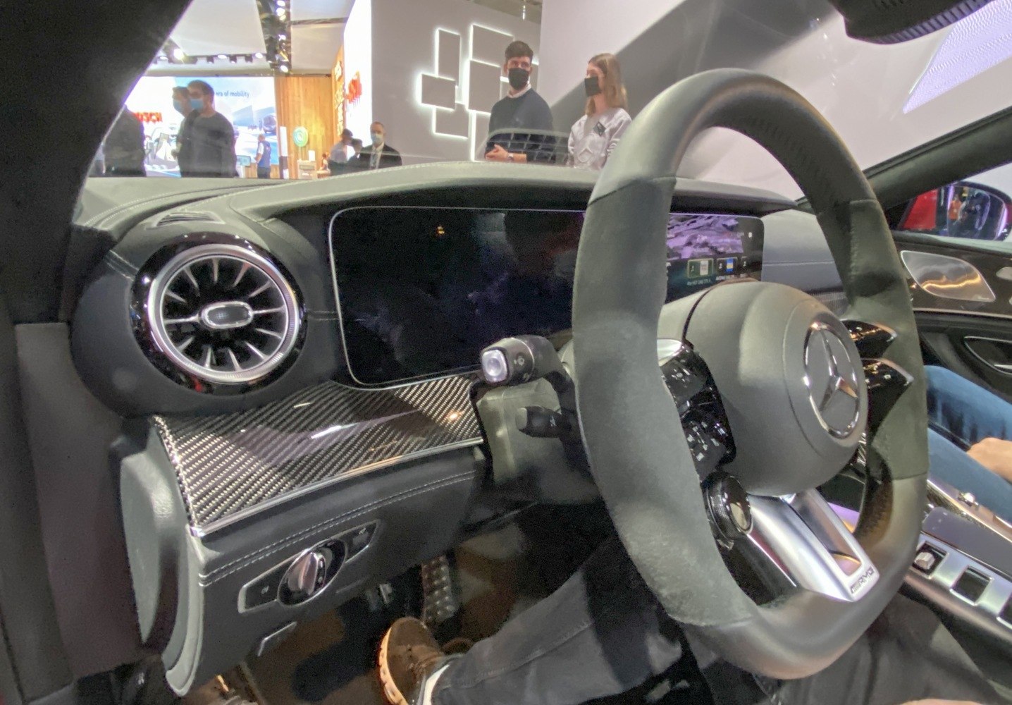 Digital dual-screen dashboard, carbon fiber trim, AMG sport steering wheel