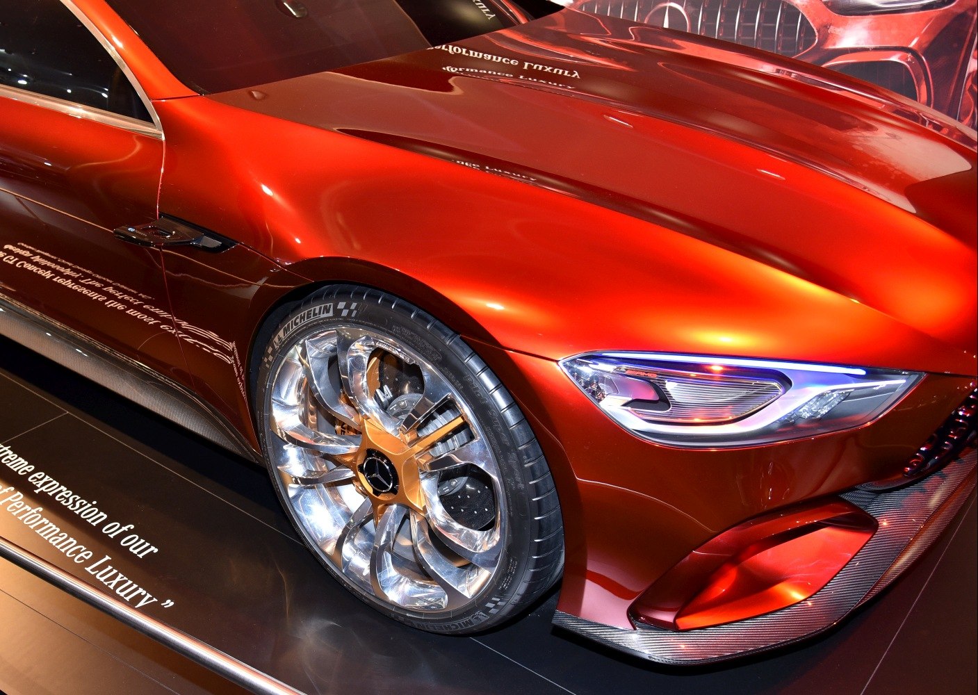 Futuristic headlight and distinctive multi-spoke luxury wheel with Michelin tires