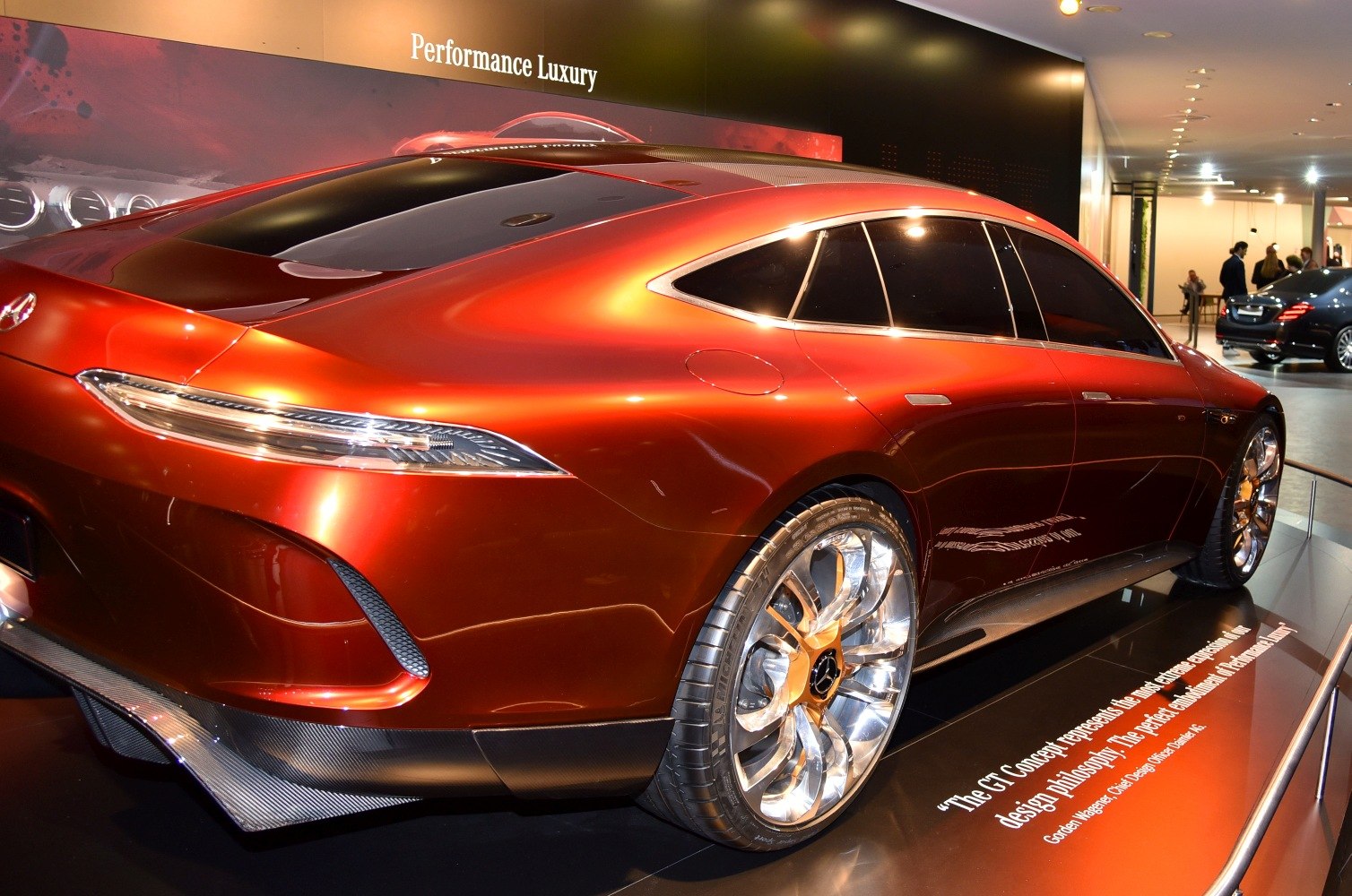 Futuristic rear quarter and rear lights of a luxury 4-door coupe