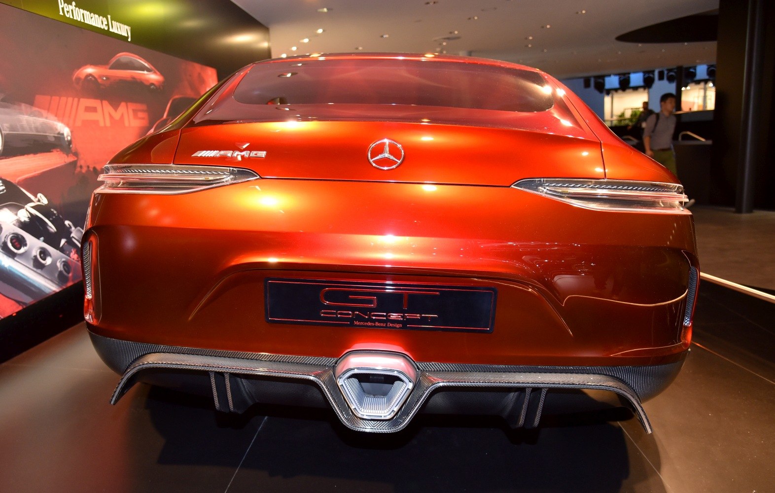Rear view with slim taillights and central exhaust