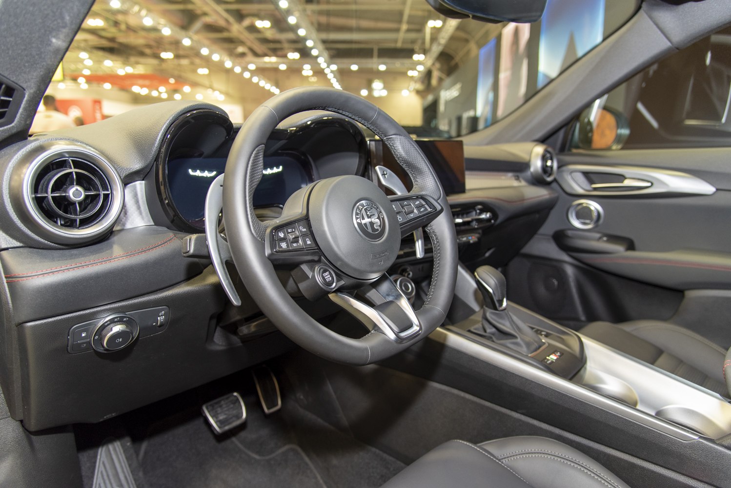 Steering wheel and digital instrument cluster of modern car interior