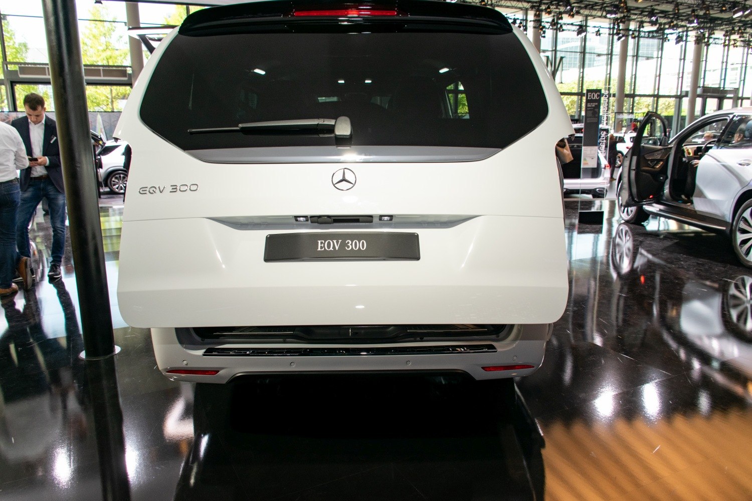 Rear view of a white electric van with EQV 300 badge
