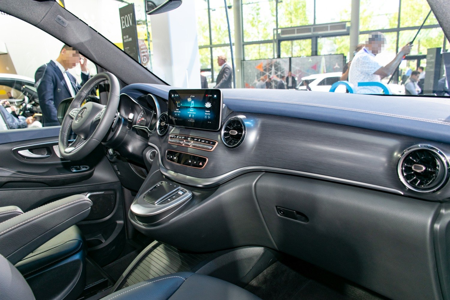 Modern dashboard and steering wheel with digital display and air vents