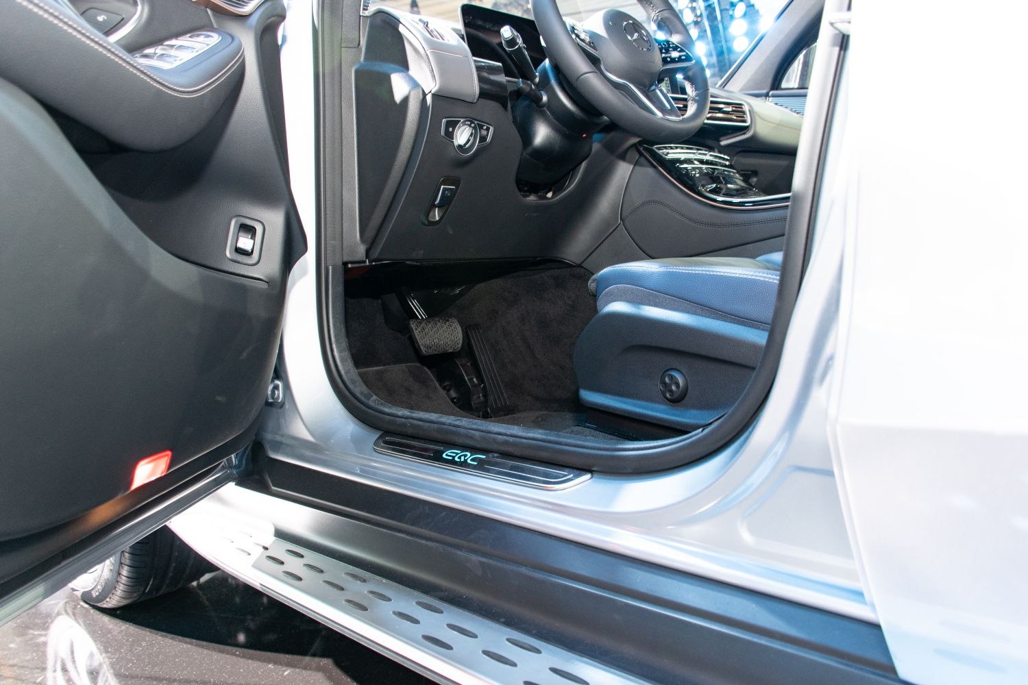 Illuminated door sill plate and driver’s footwell area with pedals