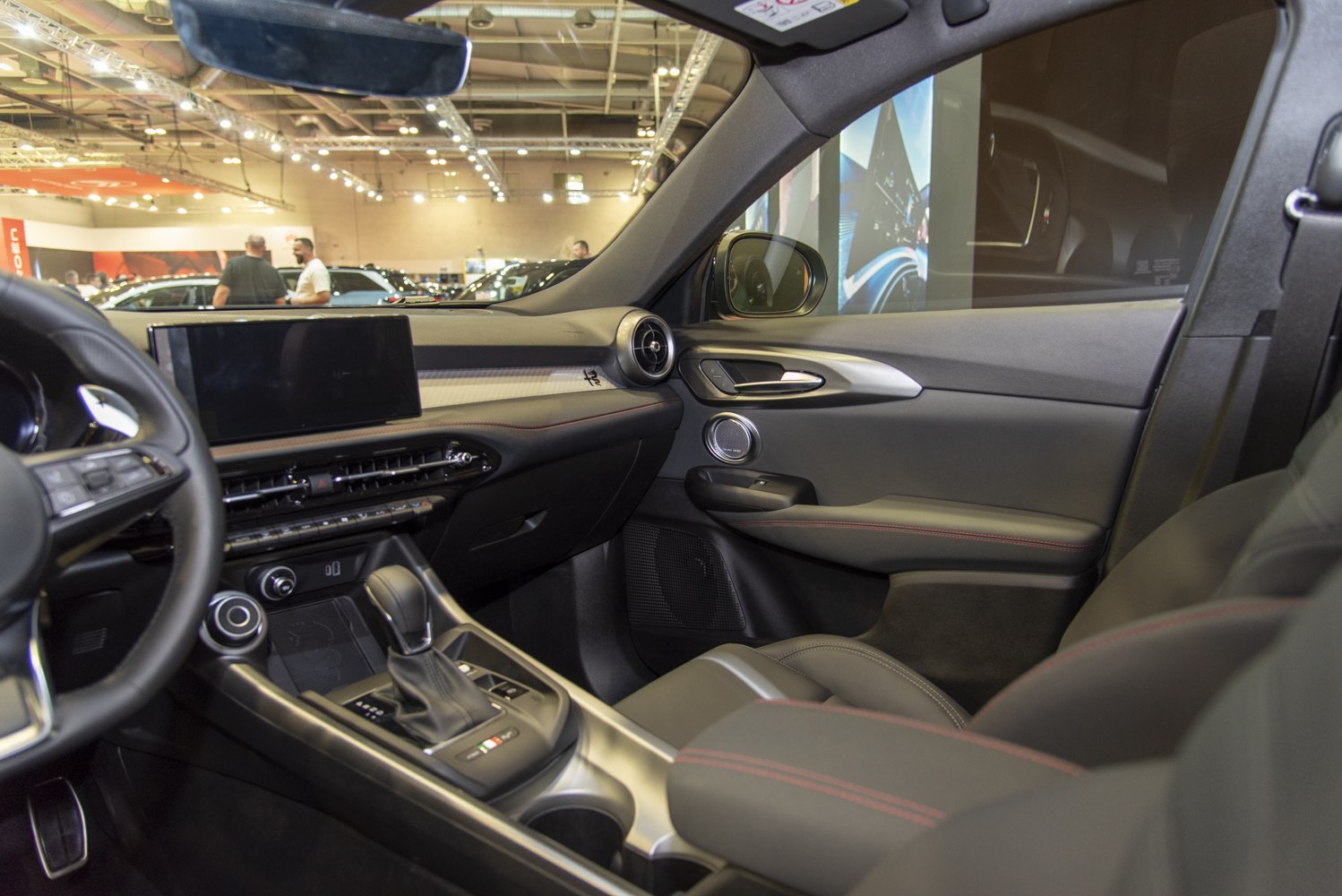 Car interior dashboard, gear shift, door panel with modern controls