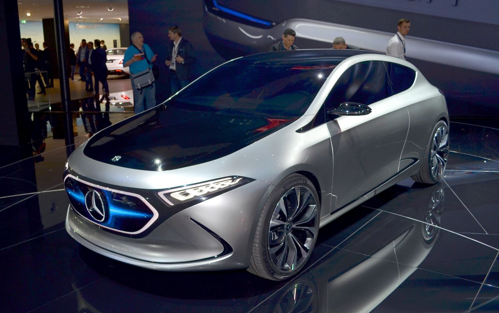 Futuristic electric hatchback with LED headlights and sleek aerodynamic body