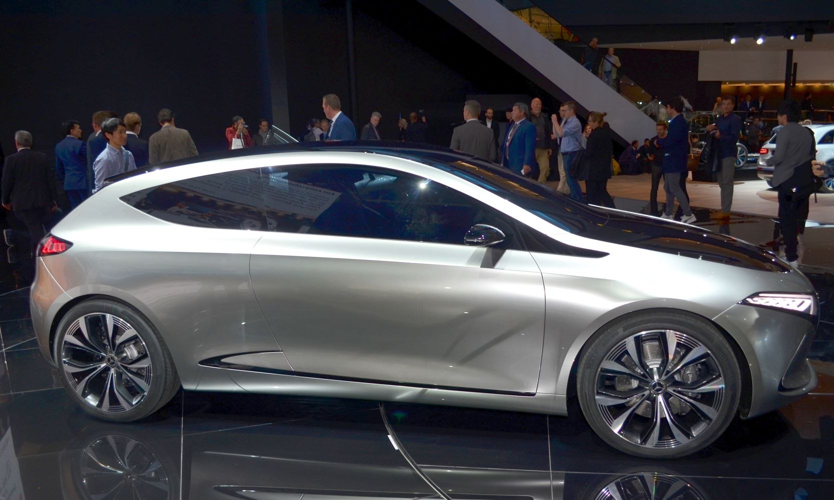 Silver electric concept car with LED headlights and futuristic alloy wheels