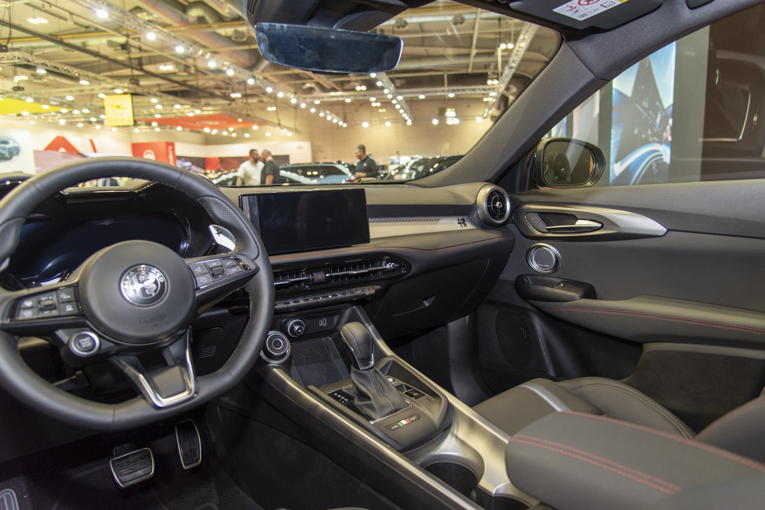 Modern car interior with digital dashboard and steering wheel