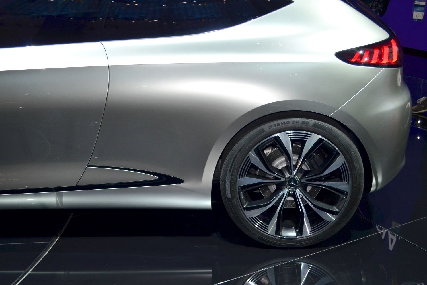 Rear side profile with alloy wheel and taillight