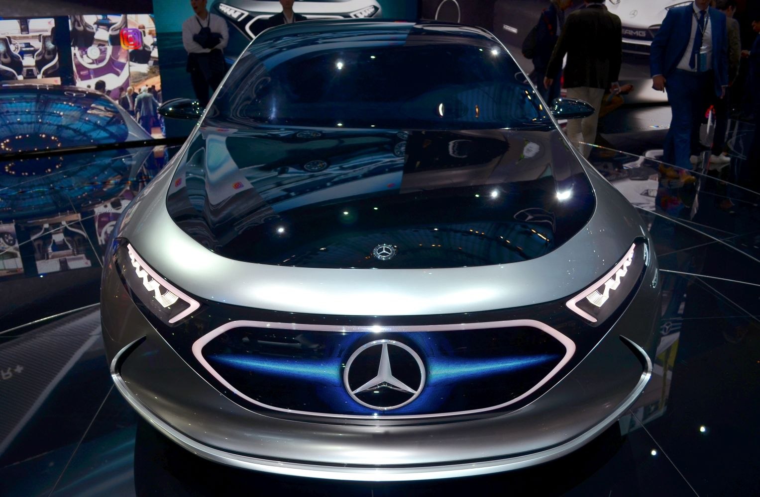 Futuristic front grille and LED headlights with illuminated Mercedes emblem