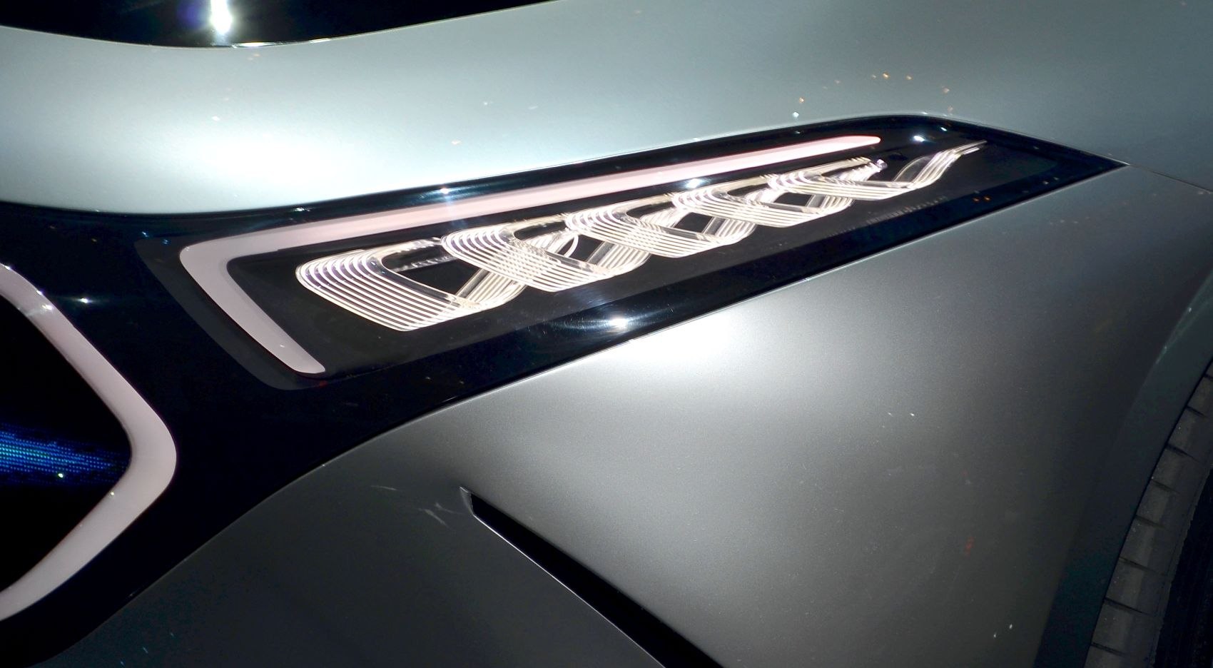 Futuristic front LED headlight design with intricate light patterns