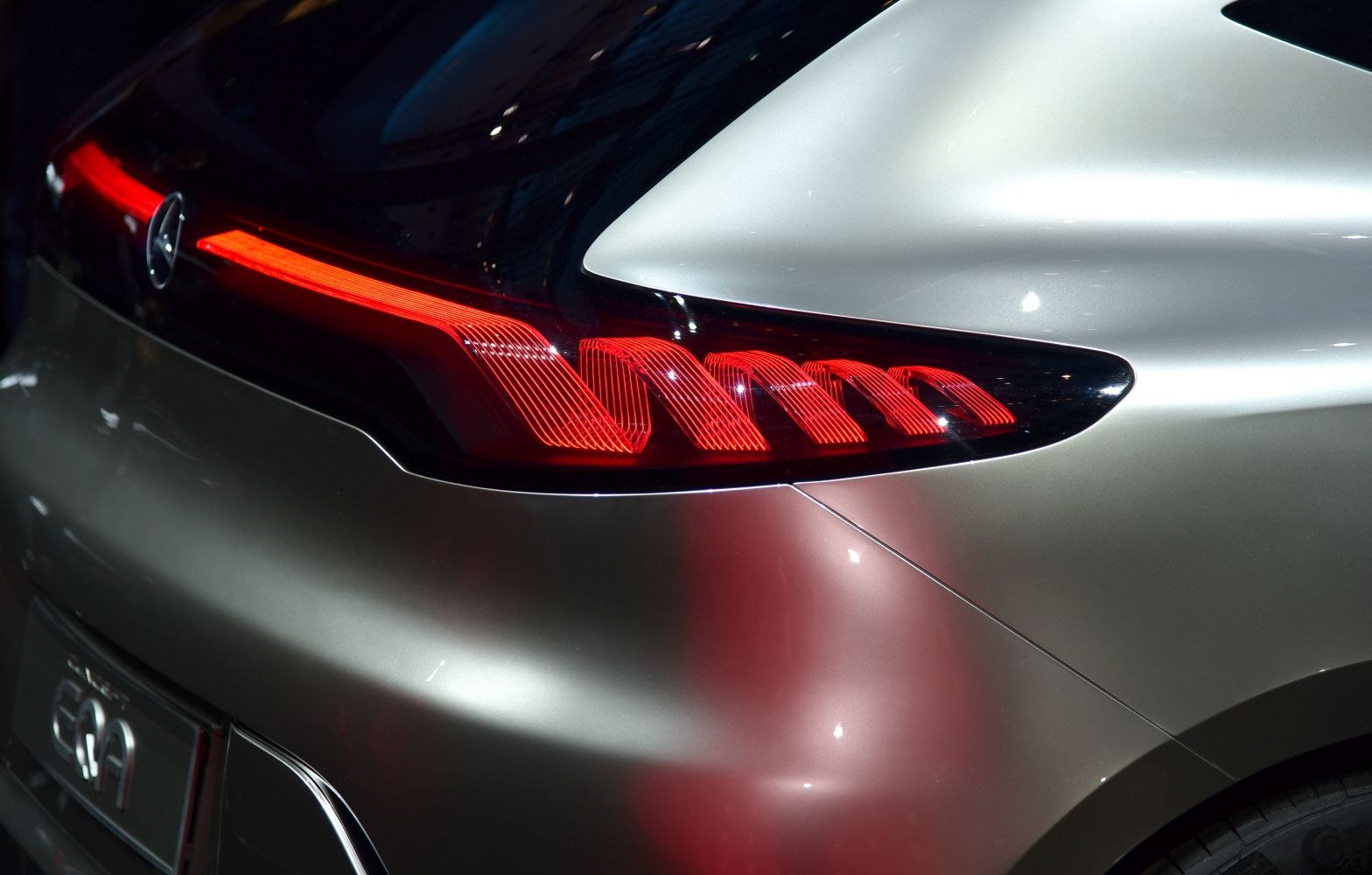 Close-up of futuristic LED rear tail light design.