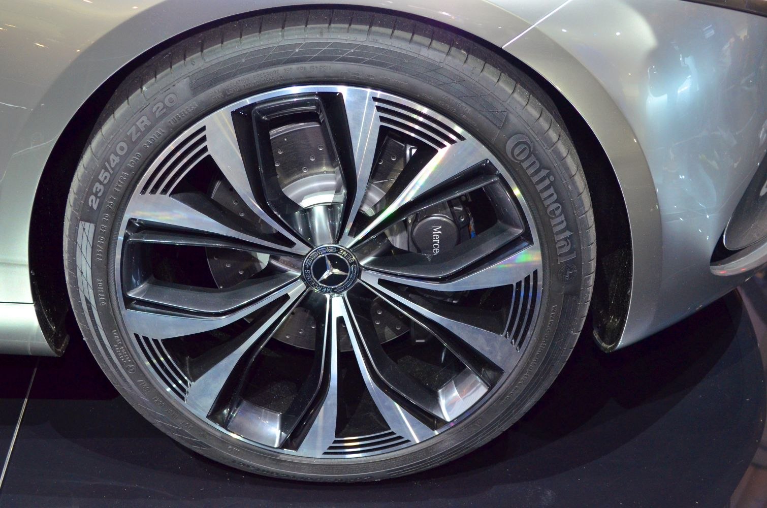 Close-up of a multi-spoke alloy wheel with Continental tire