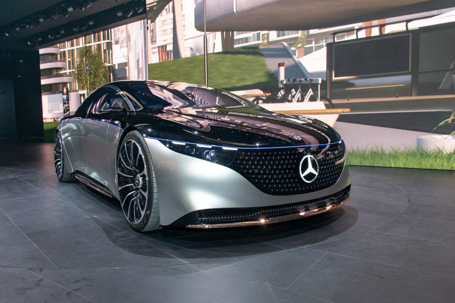Sleek electric sedan with LED headlights and aerodynamic aero wheels