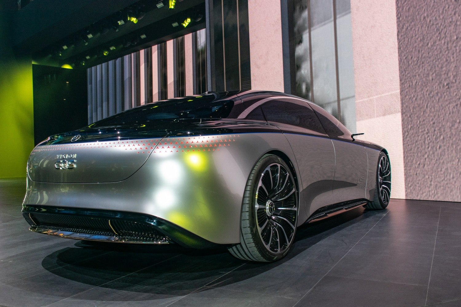 Smooth rear with futuristic LED light accents and large wheels