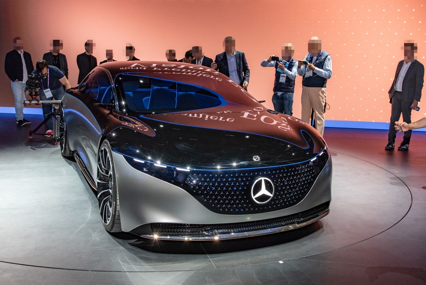 Futuristic concept car with sleek aerodynamic body and illuminated grille
