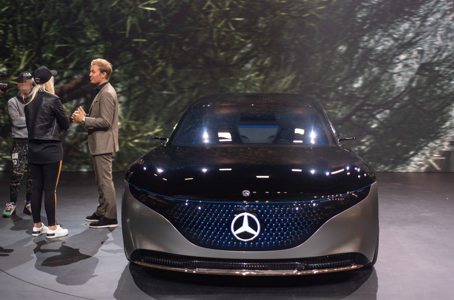 Futuristic front grille and sleek design with illuminated logo