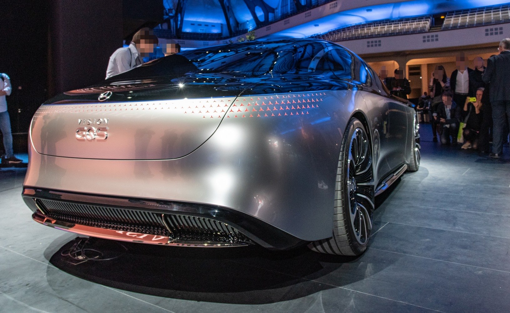 Sleek rear design with futuristic taillights of luxury electric sedan.