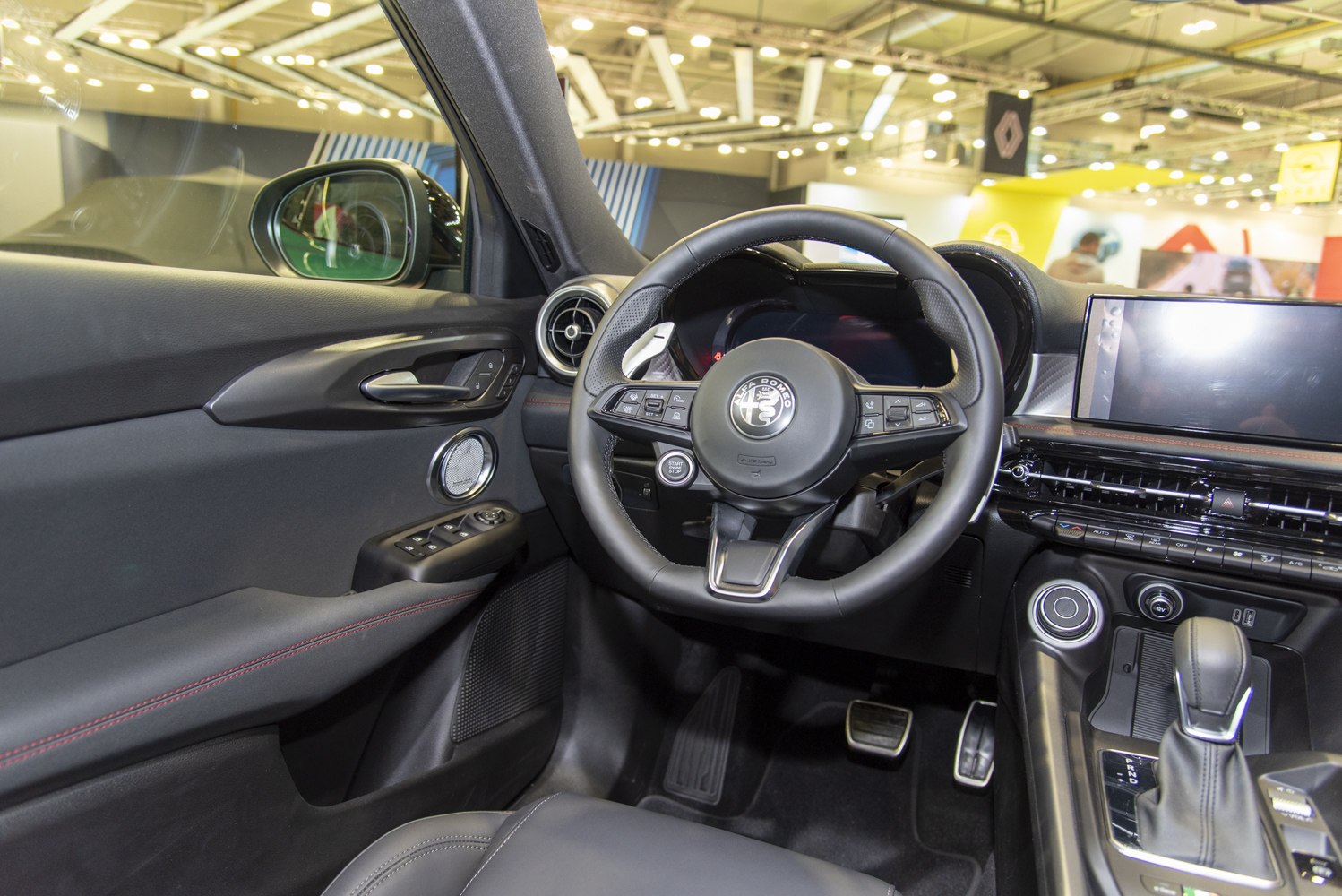 Modern steering wheel and dashboard with digital displays