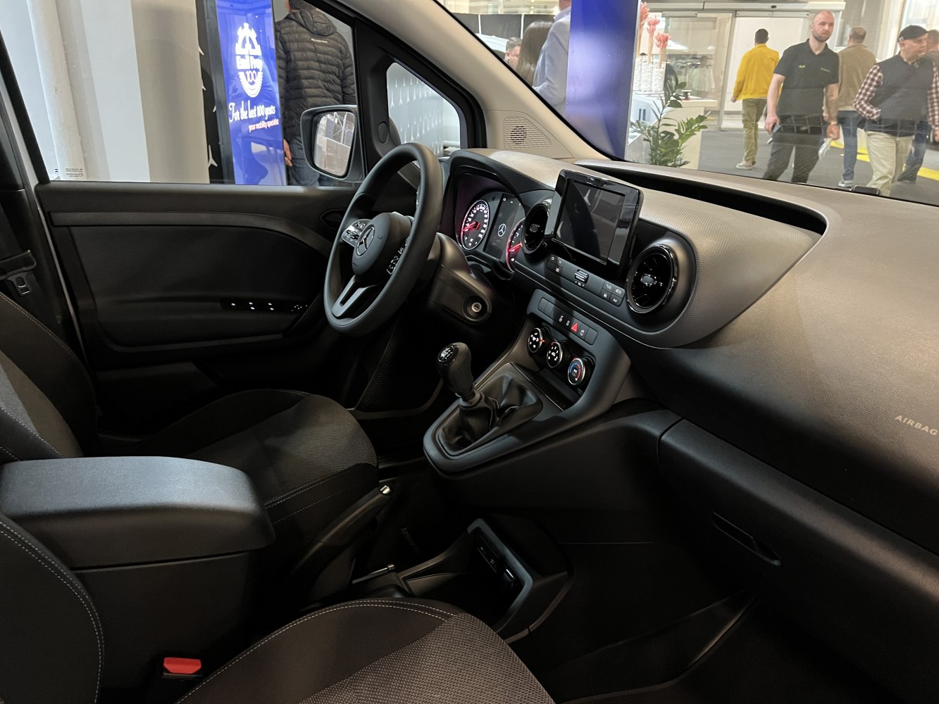 Modern car interior with digital dashboard and touchscreen infotainment