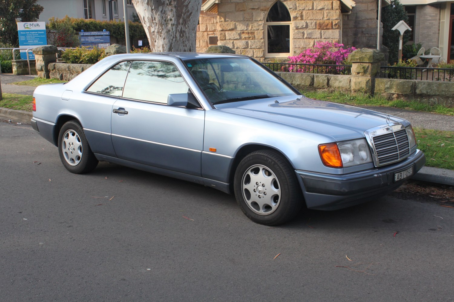Two-door silver coupe with classic grille and facelift design