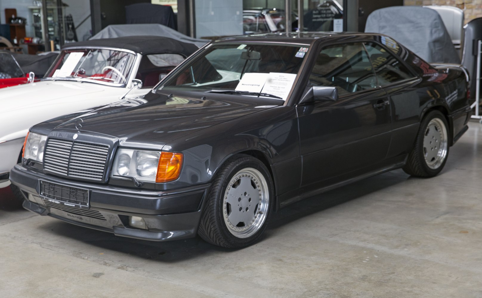 1989 coupe with AMG front styling and classic Mercedes grille