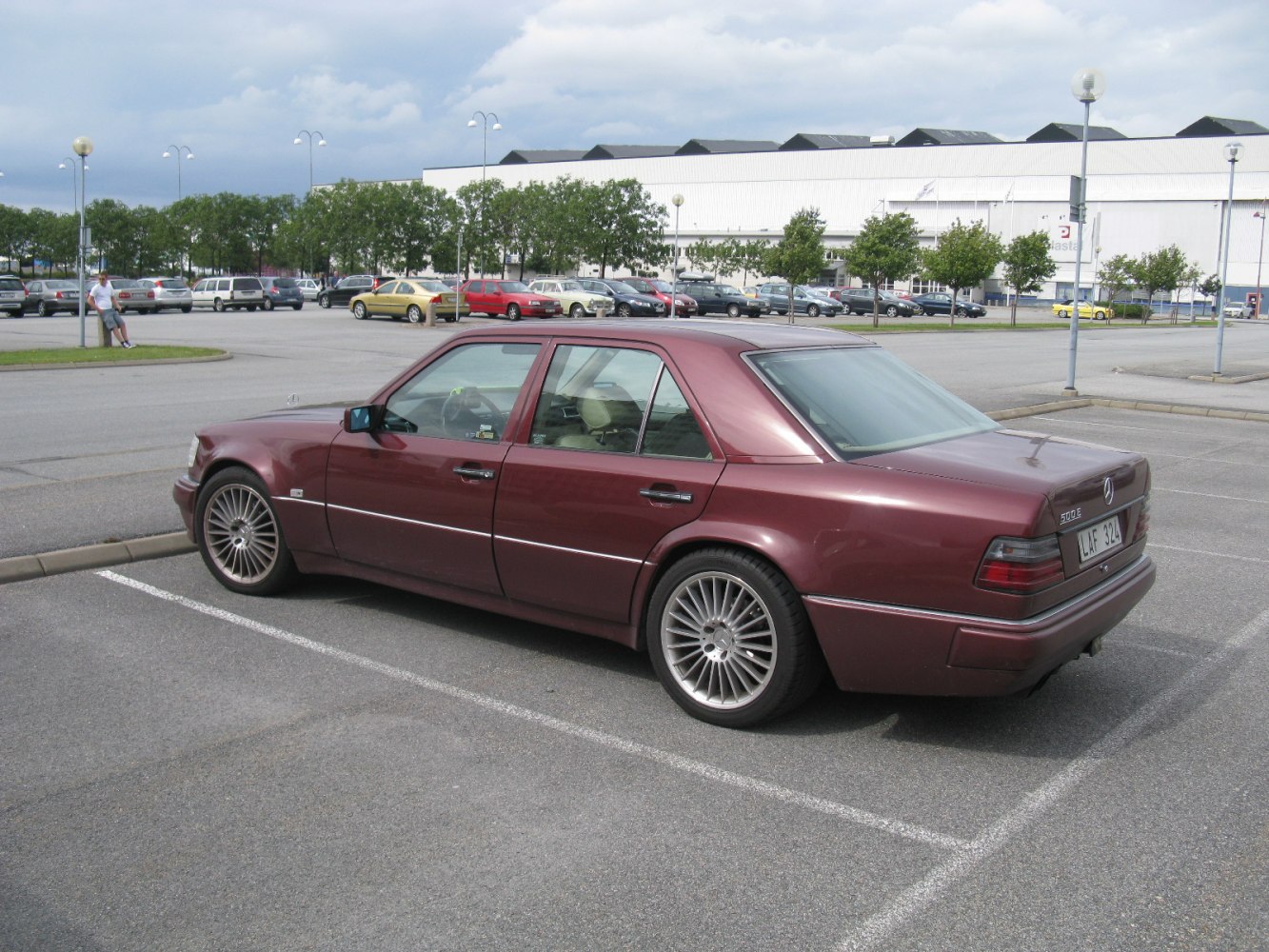 Classic sedan rear and side profile with alloy wheels