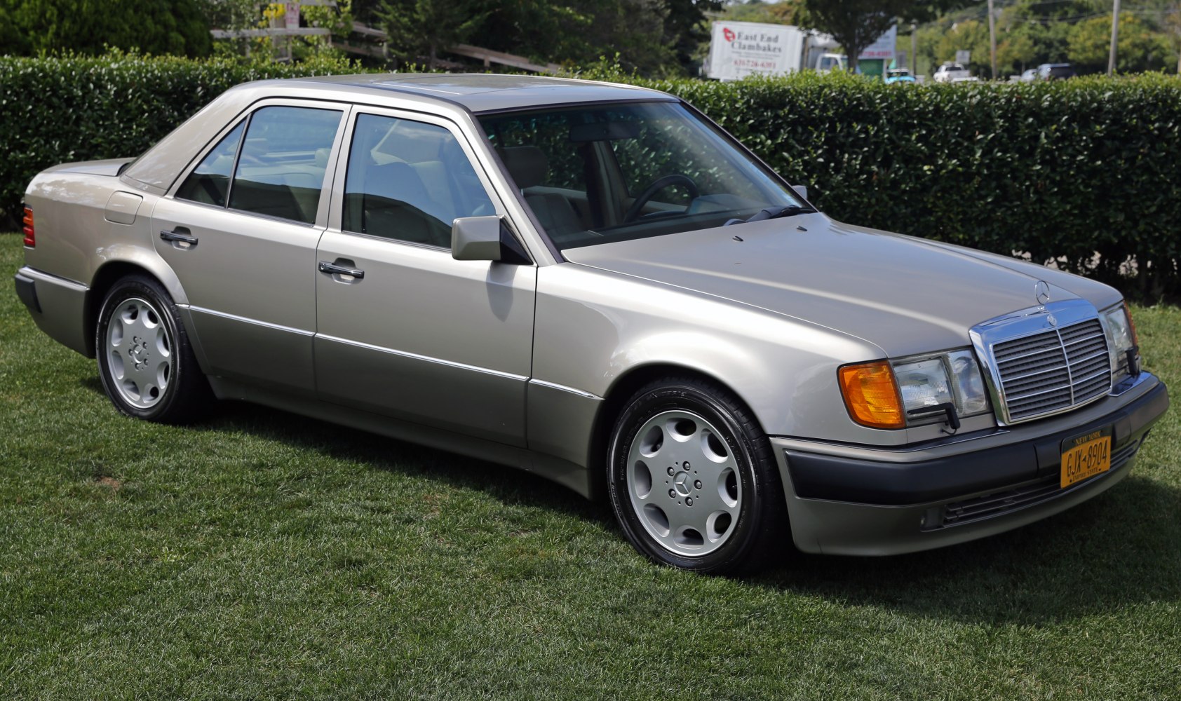 Facelifted 1989 sedan with classic alloy wheels and angular body design