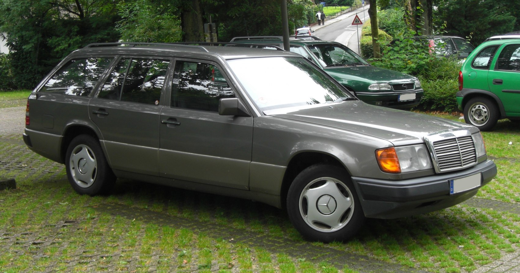 Boxy station wagon with roof rails and large rear windows