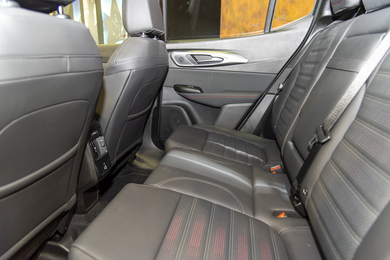 Leather rear seats with door panel and headrests