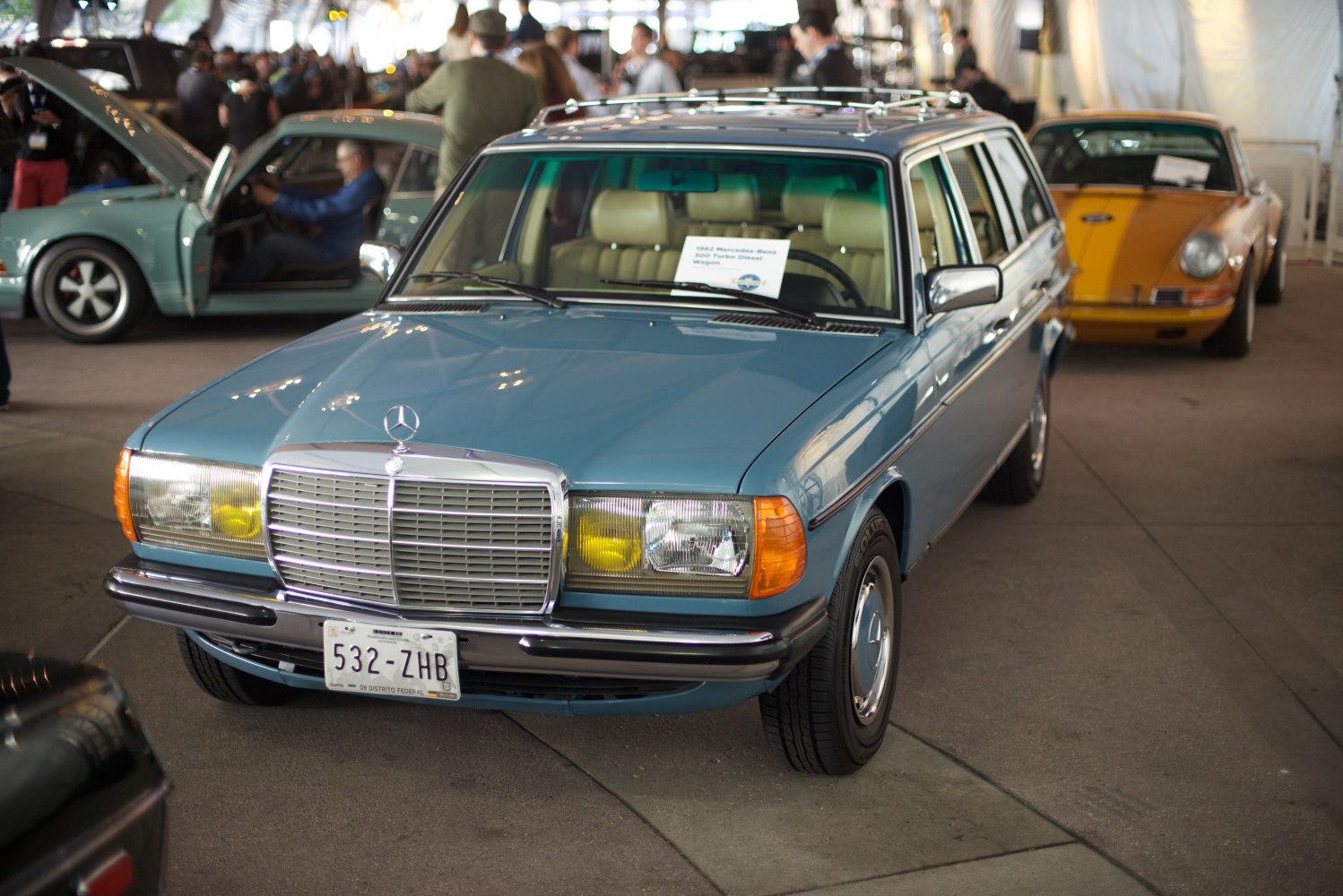 Front view of vintage station wagon with chrome grille and boxy design