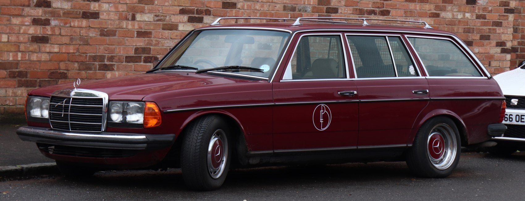 Vintage station wagon with front grille and roof rack