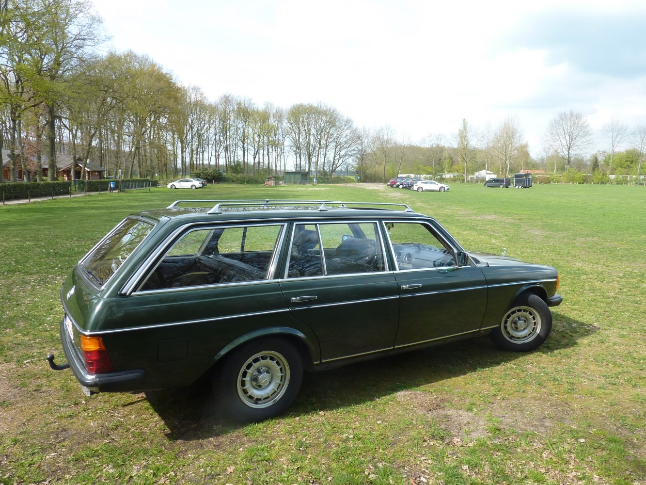 Classic station wagon with roof rails and elongated body