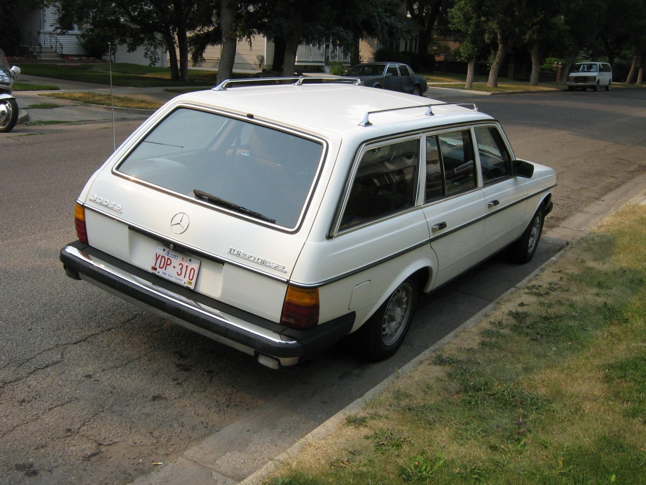 Station wagon rear view with roof rack and distinctive tailgate